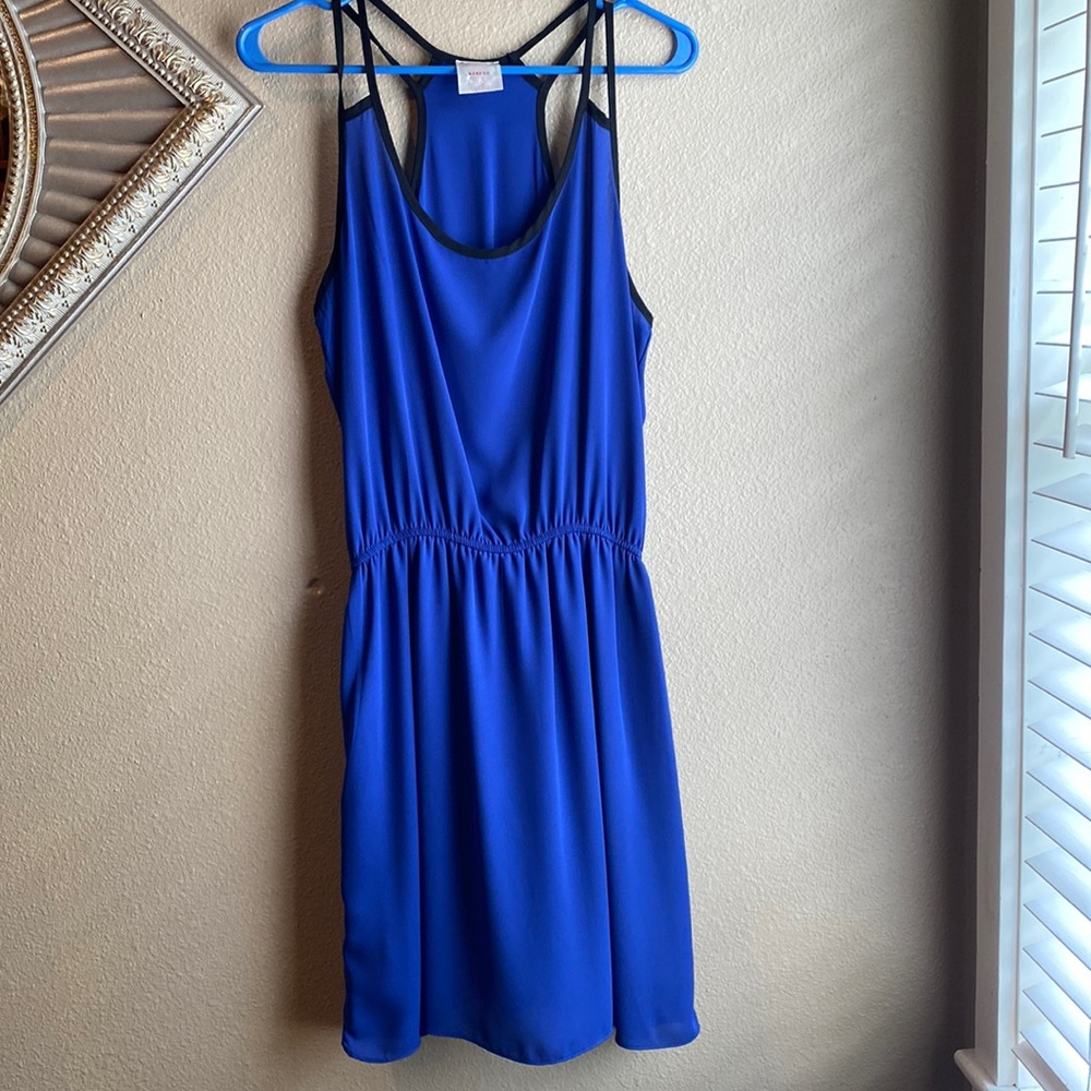 T-back sheer royal blue/black dress. Sit above the knees.